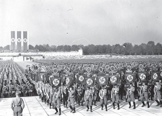 By 1938 the whole nation was marching to Hitlers relentless drumbeat every - photo 4