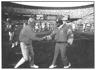 Greeting former San Francisco 49ers coach George Seifert after a game George - photo 10