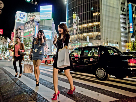 The crowds energy lights and fashions of Shibuya at night epitomize modern - photo 5