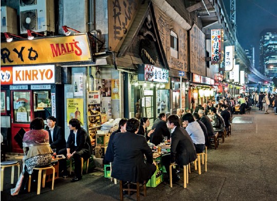 Relaxing after work at the yakitori grilled chicken restaurants underneath - photo 14