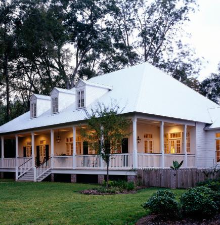 Wrap around verandas and an elevated foundation elegantly create a home that - photo 6