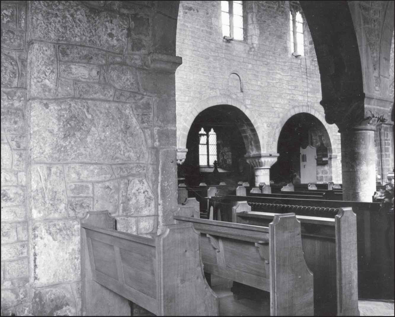 The Normans enlarged the Anglo-Scandinavian church by creating arches through - photo 3