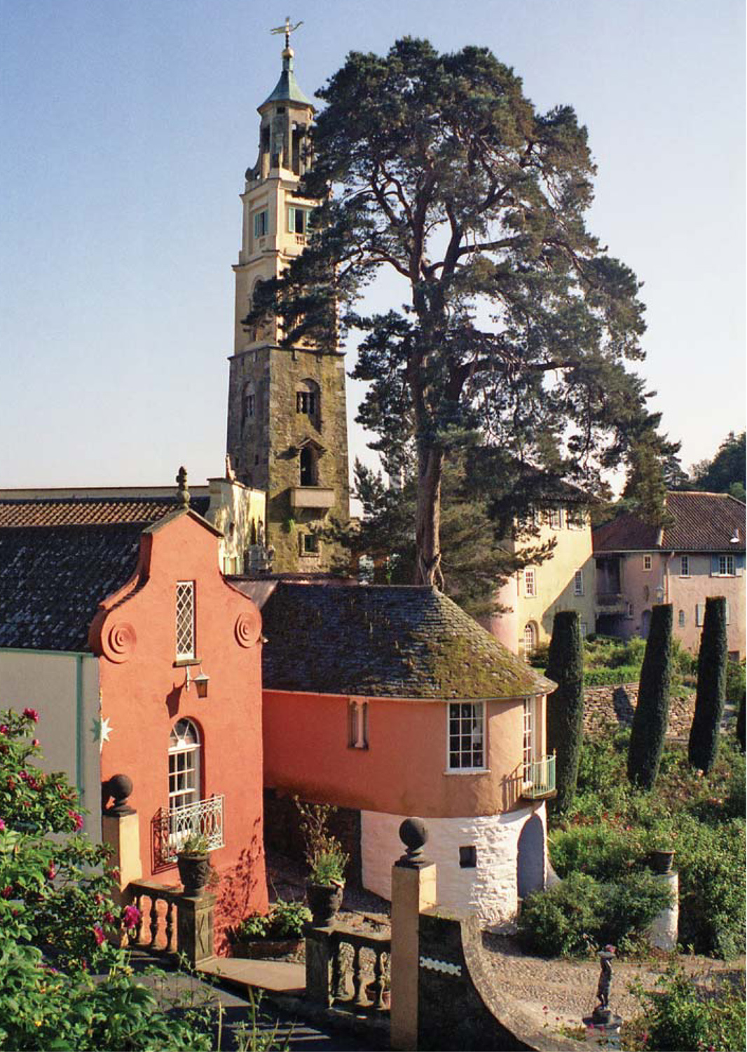 The Portmeirion holiday village basking in sun with the tower at its high - photo 9