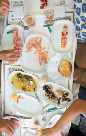 You have to dig in with your hands to eat this feast of seafood at Cervejaria - photo 7