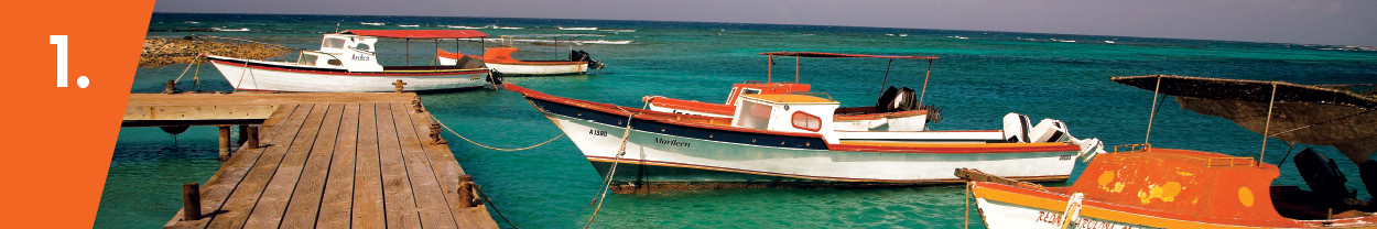 WELCOME TO ARUBA Cruise ships gleam in Oranjestad Harbour and thousands of - photo 4